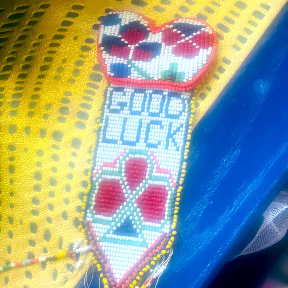 Vintage leather beaded good luck pin